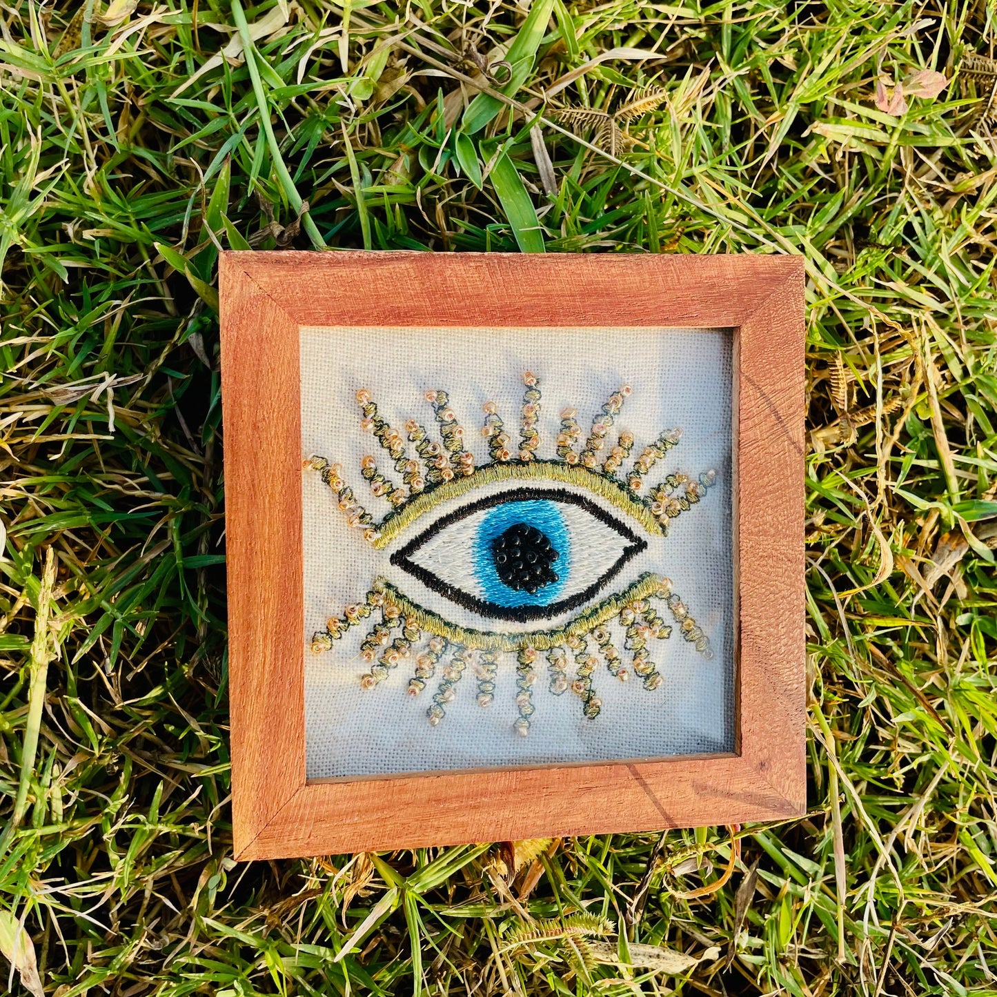 HAND-EMBROIDERED EVIL EYE COASTER