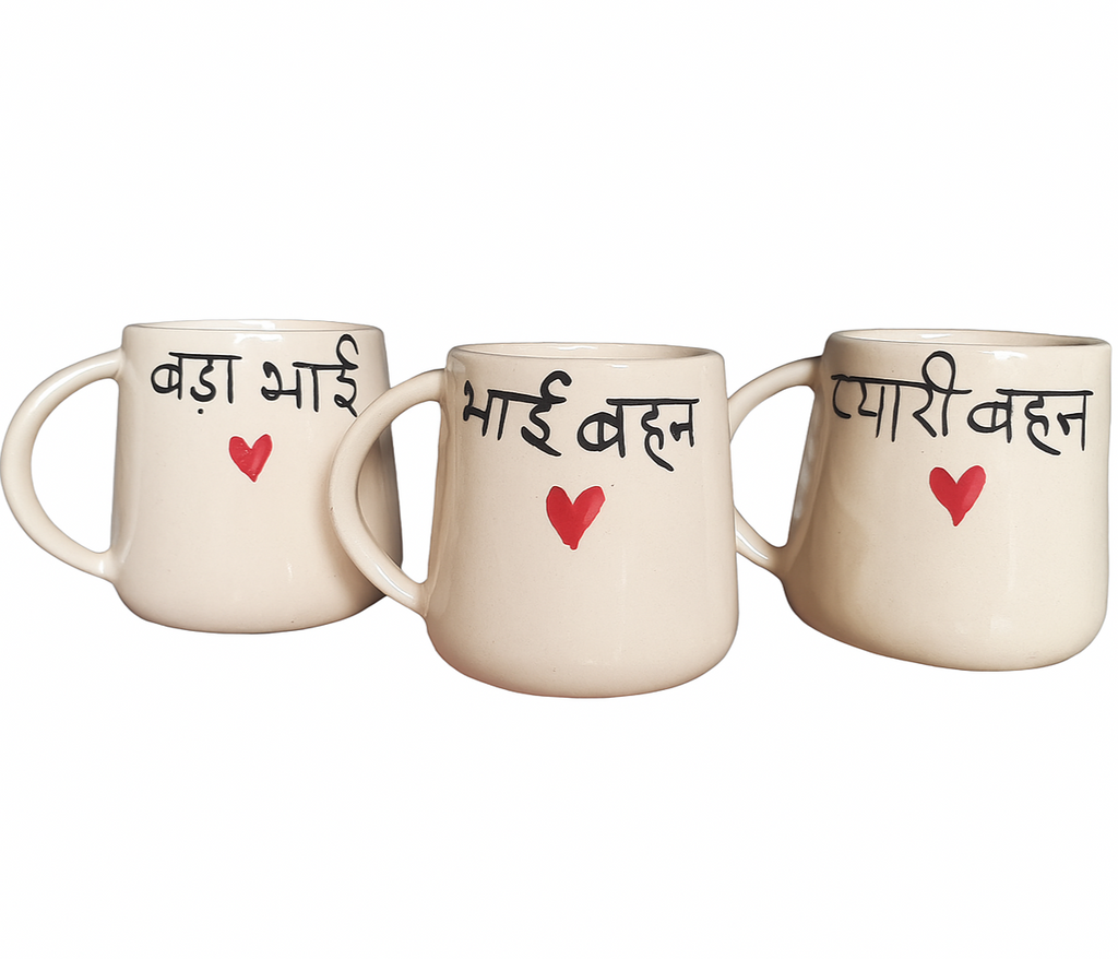 Three ceramic mugs with text and red hearts on a white background