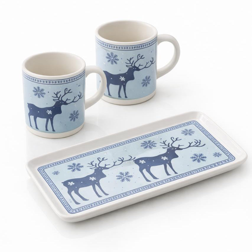 Two mugs and a tray with deer and snowflake design on a white background