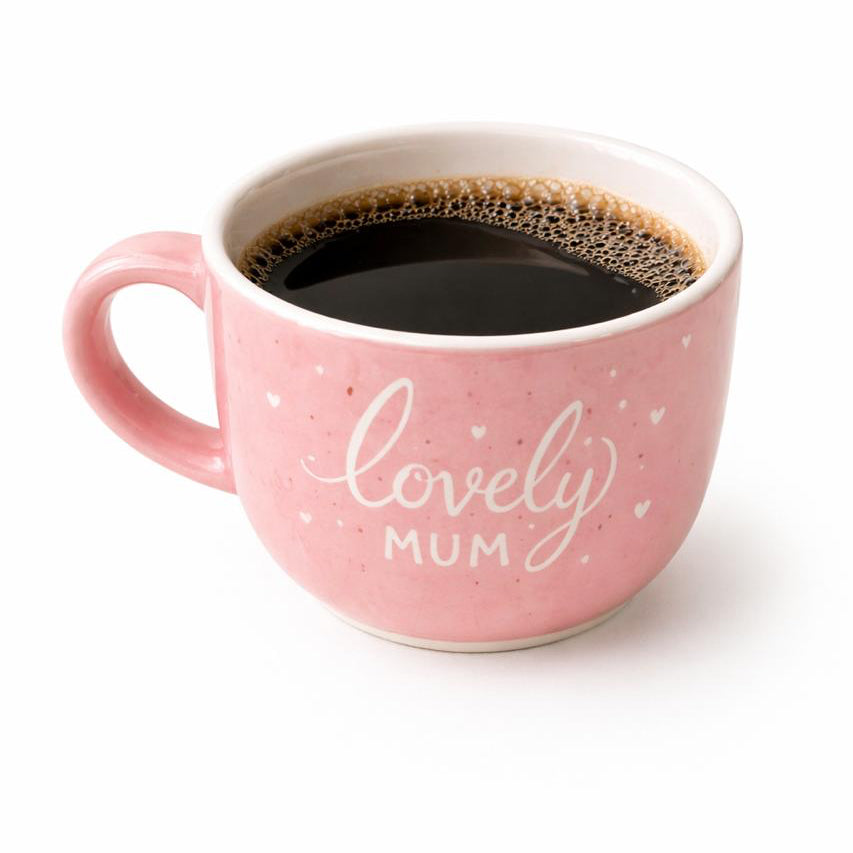 Pink mug with 'lovely mum' text filled with black coffee on a white background