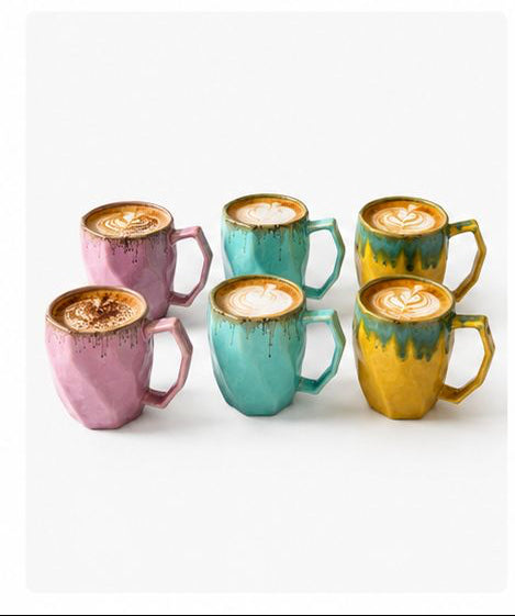 Set of colorful mugs with different designs on a white background