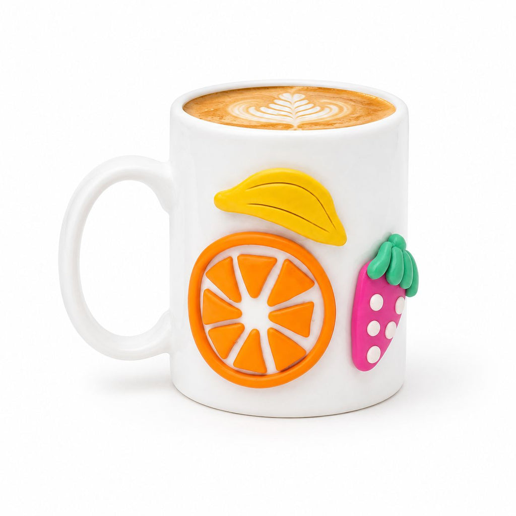 White mug with fruit-shaped silicone cozies on a white background