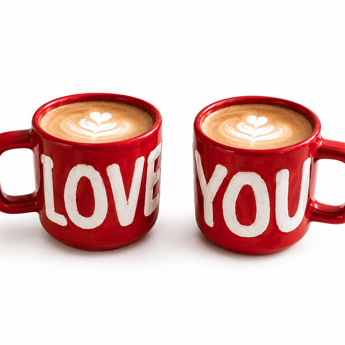 Two red mugs with 'LOVE' and 'YOU' text on a white background