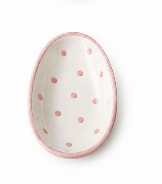 Set of six small ceramic dishes with various decorative patterns on a white background