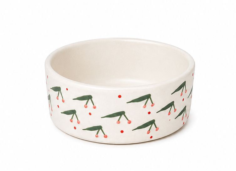 Set of four ceramic bowls with various patterns on a white background