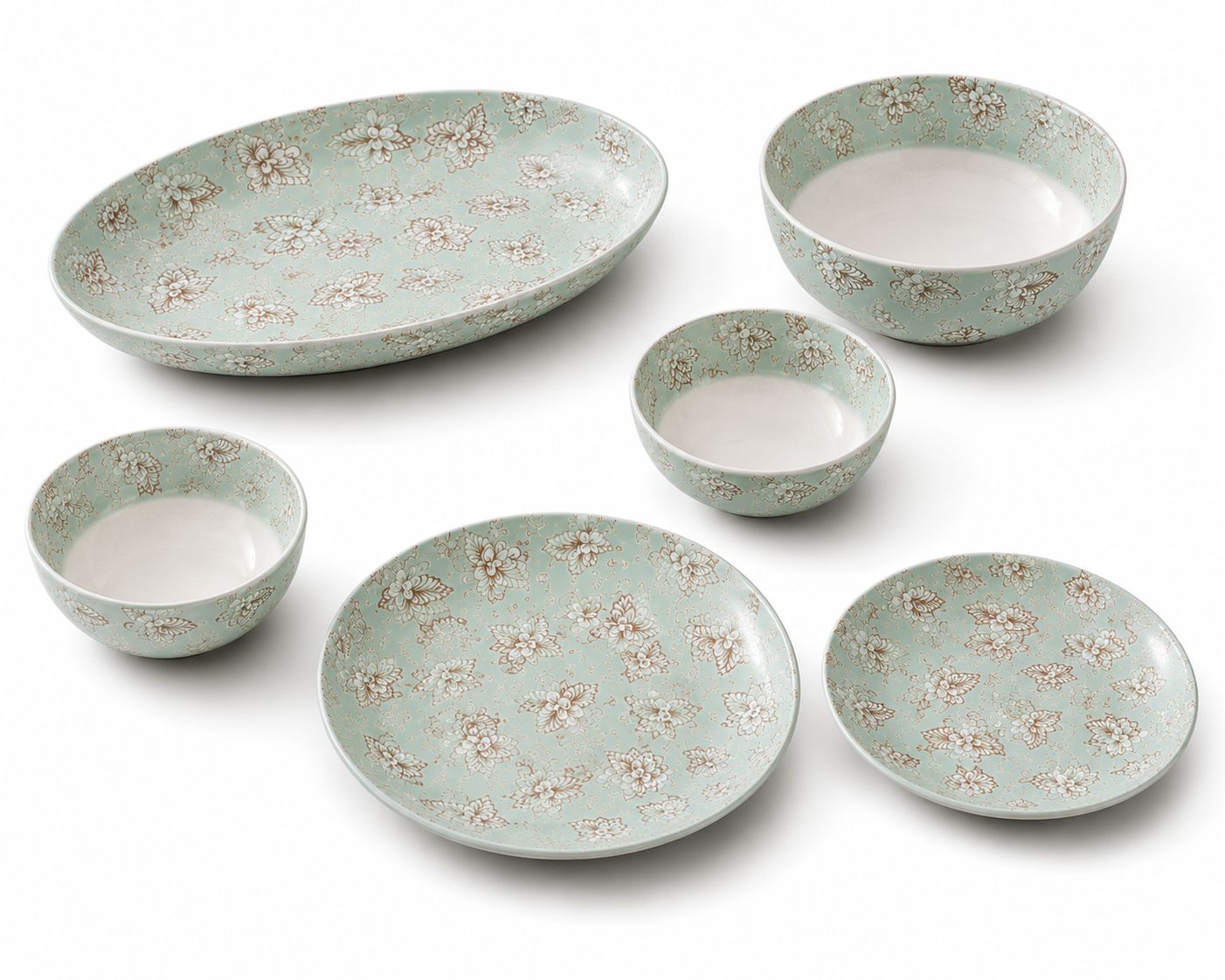 Set of ceramic dishes with floral pattern on a white background