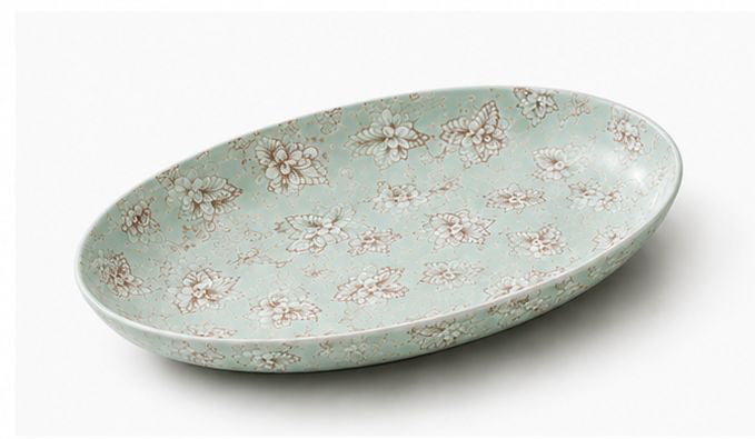 Set of ceramic dishes with floral patterns on a white background