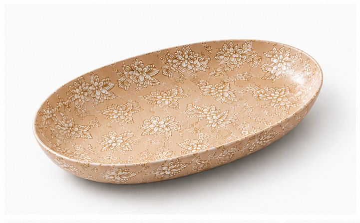 Set of ceramic plates and bowls with floral patterns on a white background