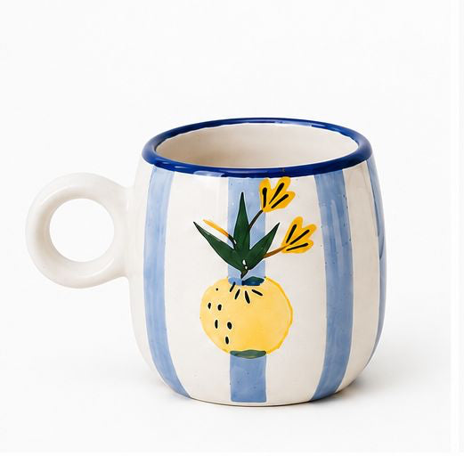 Set of six uniquely designed mugs on a white background