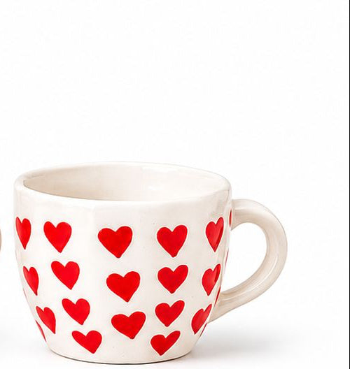 Set of six decorative mugs with various patterns on a white background