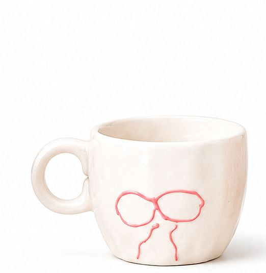 Set of six decorative mugs with various patterns on a white background