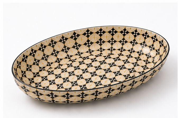 Set of ceramic bowls with geometric pattern on a white background