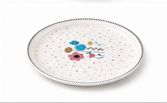 Set of six ceramic bowls with floral patterns on a white background