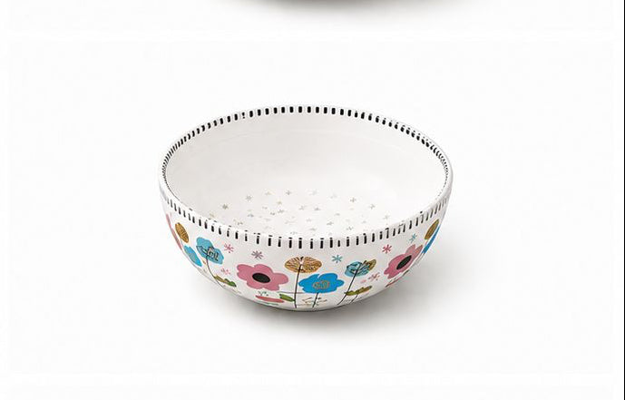 Set of six ceramic bowls with floral patterns on a white background