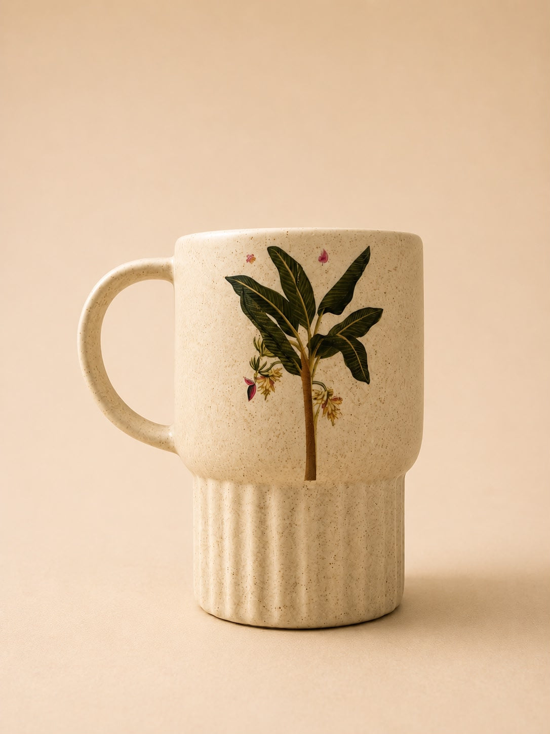 Ceramic mug with a floral design on a beige background