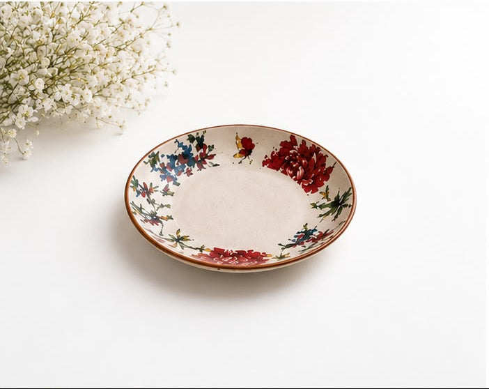 Set of ceramic bowls with floral patterns on a white background